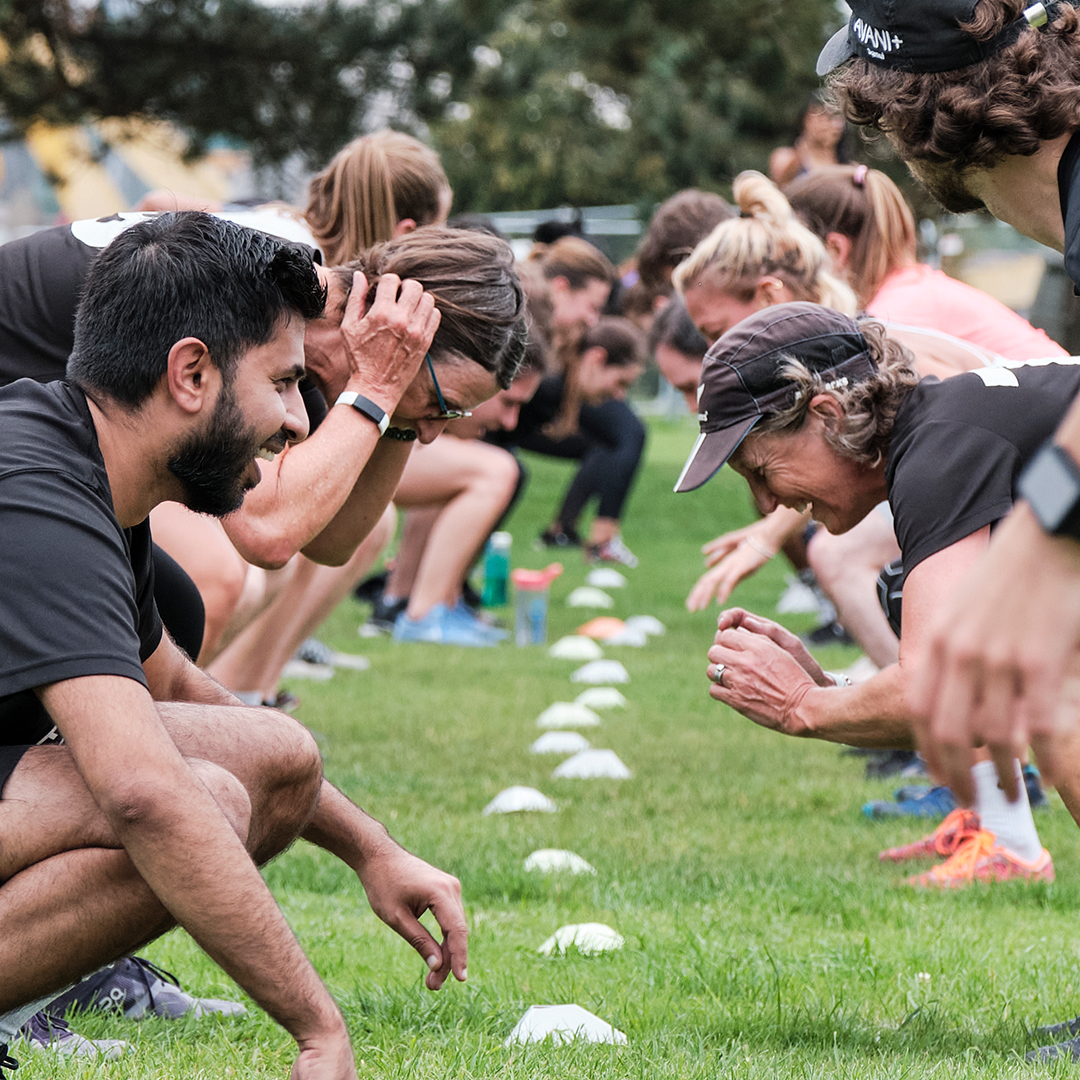 One Element members forming connection through group exercise.