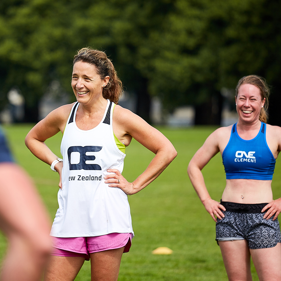 One Element members forming connection through group exercise.